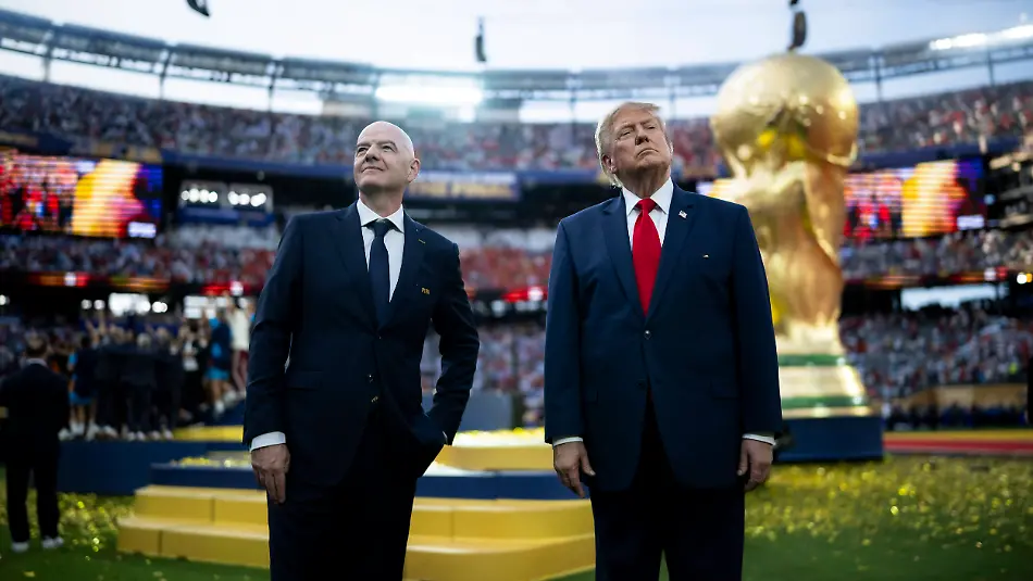 July-21-2026-Rutherford-Nj-United-States-U-S-President-Donald-Trump-right-and-FIFA-President-Gianni-Infantino-left-stand-together-on-the-pitch-before-the-trophy-presentation-during-the-World-Cup-Final-at-MetLife-Stadium-July-19-2026-in-Rutherford-New-Jersey-Spain-defeated-Argentina-1-0-claiming-the-World-Cup-Trophy-for-the-second-time