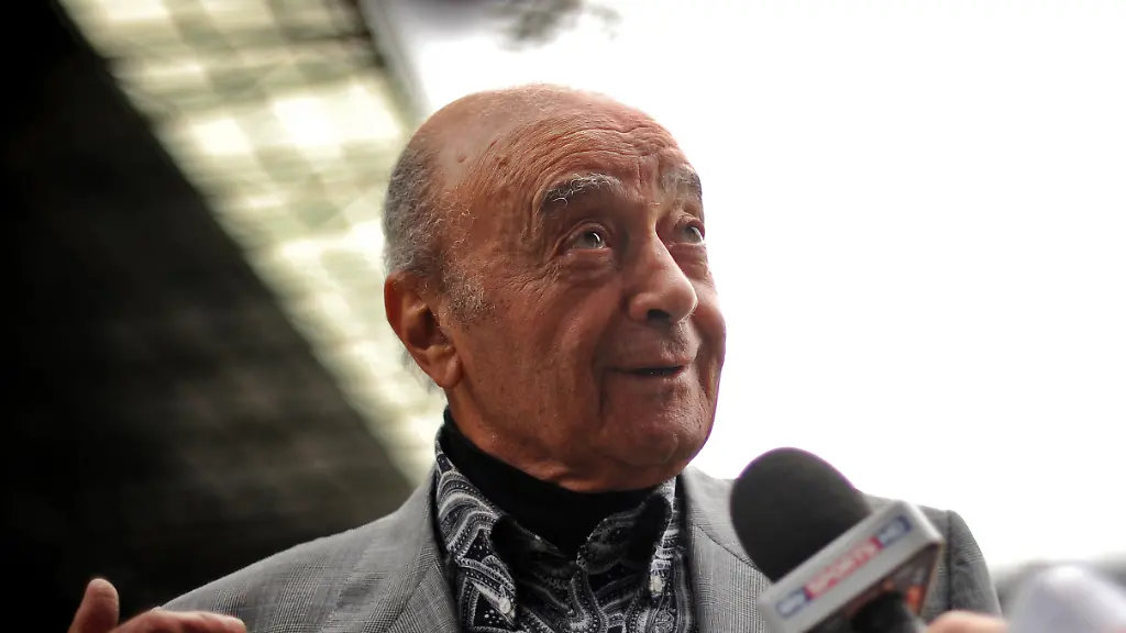 Fulham-Football-Club-s-Chairman-Mohammed-Al-Fayed-speaks-to-the-media-after-unveiling-the-club-s-new-manager-Mark-Hughes-at-the-team-s-Craven-Cottage-ground-in-London-on-August-3-2010-English-Premier-League-side-Fulham-unveiled-former-Wales-and-Manchester-City-boss-Hughes-as-their-new-manager-to-succeed-Roy-Hodgson