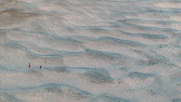 A-drone-view-shows-people-on-newly-exposed-sandbanks-on-the-Danube-River-as-water-levels-drop-during-prolonged-hot-weather-and-dry-conditions-in-Apatin-Serbia-July-26-2026