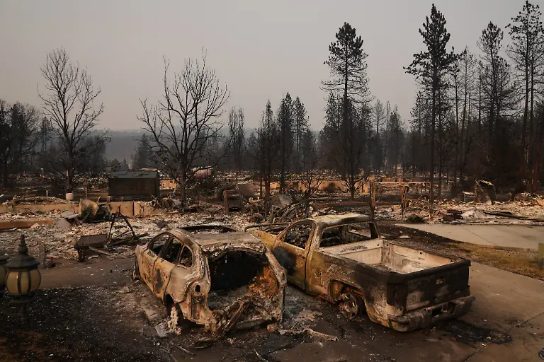 Dozens-of-homes-are-seen-burned-to-the-ground-after-a-wildfire-hit-the-northern-part-of-Spokane-Wash-Monday-Aug-3-2026