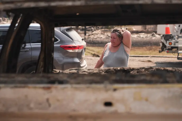 Michelle-Angstrom-reacts-to-her-burned-down-home-and-property-after-a-wildfire-hit-the-northwest-part-of-Spokane-Wash-Tuesday-Aug-4-2026