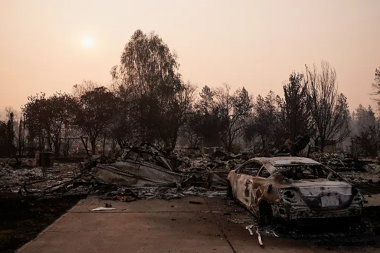 A-view-of-a-destroyed-vehicle-in-the-area-burned-by-the-Old-Trails-Fire-wildfire-in-Spokane-Washington-U-S-August-4-2026