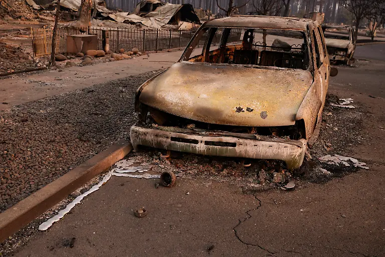 A-view-of-a-destroyed-vehicle-in-the-area-burned-by-the-Old-Trails-Fire-wildfire-in-Spokane-Washington-U-S-August-4-2026