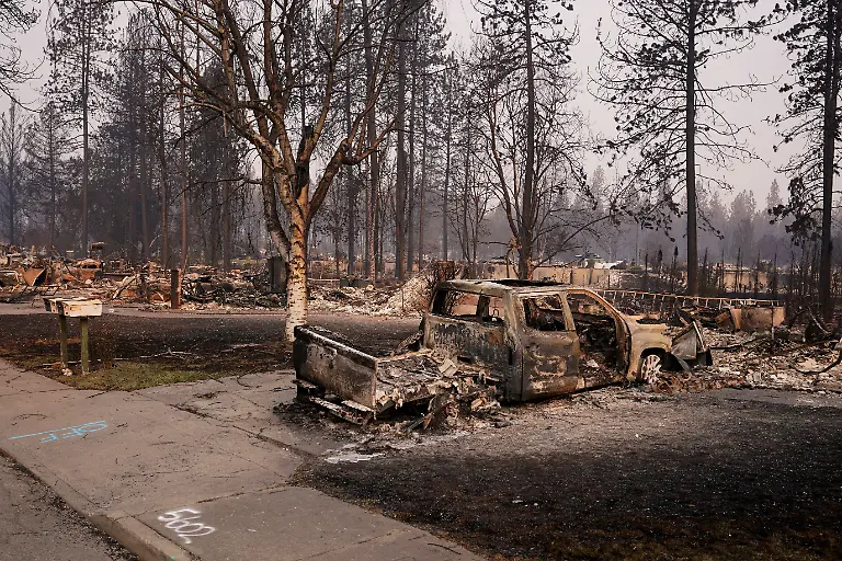 A-view-of-a-vehicle-in-the-area-burned-by-the-Old-Trails-Fire-wildfire-in-Spokane-Washington-U-S-August-4-2026