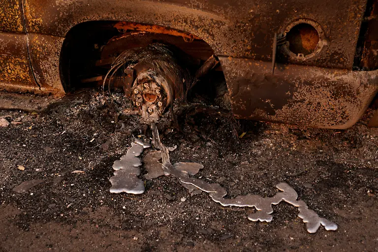 A-view-of-a-destroyed-vehicle-in-the-area-burned-by-the-Old-Trails-Fire-wildfire-in-Spokane-Washington-U-S-August-4-2026