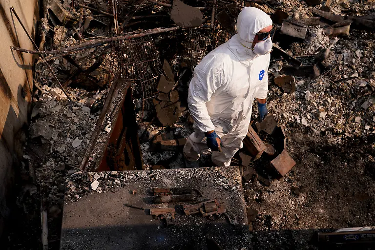 A-view-shows-firearms-that-were-retrieved-from-the-house-of-Jeff-Clauson-which-was-burned-by-the-Old-Trails-Fire-in-Spokane-Washington-U-S-August-4-2026