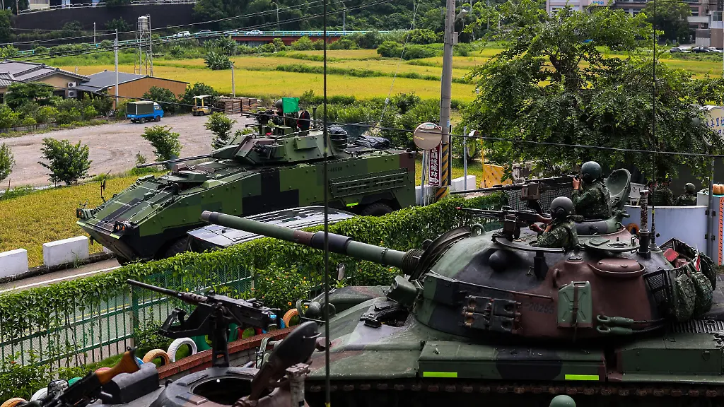 TAICHUNG-TAIWAN-JULY-16-CM-11-tanks-and-a-CM-34-armored-vehicle-are-mobilised-during-a-deep-battle-exercise-simulating-how-to-curb-invading-forces-from-pushing-forward-as-part-of-the-ongoing-Han-Kuang-military-exercise-on-the-outskirts-in-Taichung-Taiwan-on-July-16-2025-The-exercise-mobilises-multiple-CM-11-Tanks-CM-32-and-CM-34-Armored-Vehicles-tactical-short-range-unmanned-aerial-drones-UAV-as-well-as-ground-troops-to-simulate-a-deep-operation-to-slow-down-enemy-s-movements-and-weaken-their-combat-capabilities-in-the-event-of-Chinese-invasion-of-the-self-governing-island-The-drill-comes-after-38-Chinese-Liberation-Army-s-warplanes-and-UAVs-today-July-16-were-detected-crossing-Taiwan-s-air-defense-identification-zone