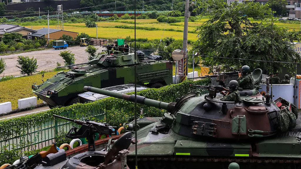 TAICHUNG-TAIWAN-JULY-16-CM-11-tanks-and-a-CM-34-armored-vehicle-are-mobilised-during-a-deep-battle-exercise-simulating-how-to-curb-invading-forces-from-pushing-forward-as-part-of-the-ongoing-Han-Kuang-military-exercise-on-the-outskirts-in-Taichung-Taiwan-on-July-16-2025-The-exercise-mobilises-multiple-CM-11-Tanks-CM-32-and-CM-34-Armored-Vehicles-tactical-short-range-unmanned-aerial-drones-UAV-as-well-as-ground-troops-to-simulate-a-deep-operation-to-slow-down-enemy-s-movements-and-weaken-their-combat-capabilities-in-the-event-of-Chinese-invasion-of-the-self-governing-island-The-drill-comes-after-38-Chinese-Liberation-Army-s-warplanes-and-UAVs-today-July-16-were-detected-crossing-Taiwan-s-air-defense-identification-zone