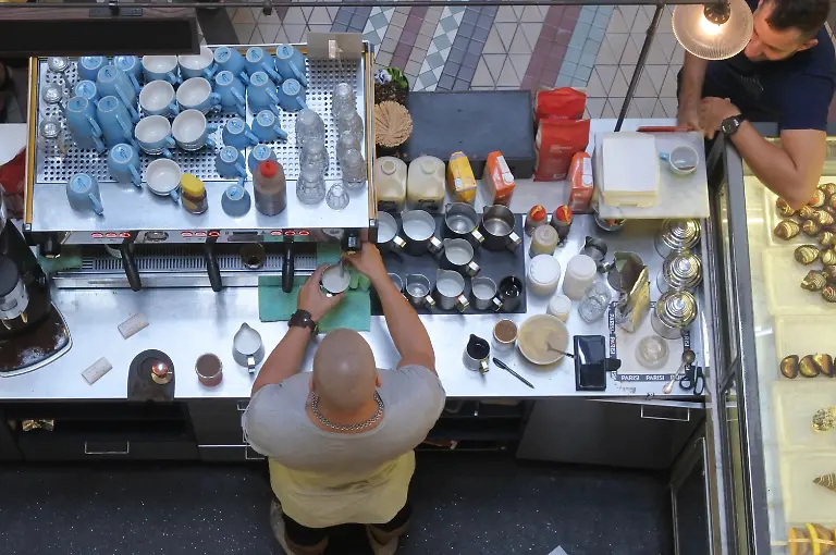 SYDNEY-FEB-21-2019-Above-view-of-a-barista-making-a-coffee-in-Sydney-New-South-Wales-Australia-Three-quarters-of-Australians-have-at-least-one-cup-a-day