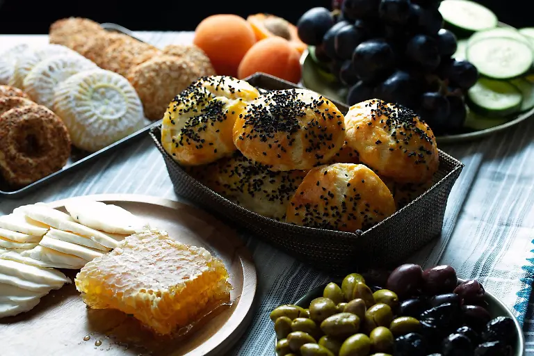 April-20-2020-IL-USA-A-typical-Turkish-breakfast-spread-includes-a-bevy-of-cheese-olives-local-honey-fruits-and-baked-goods-like-pogaca-and-gazleme-USA-ZUMAm67-20200420zafm67002-Copyright-xE