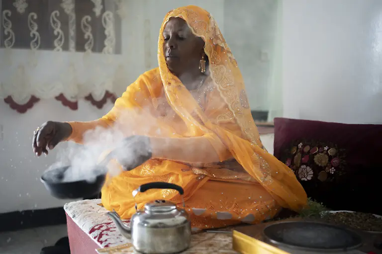 From-bean-to-cup-Ethiopia-s-renowned-Harar-coffee-and-its-enduring-heritage-HARAR-ETHIOPIA-MAY-24-A-woman-roasts-coffee-beans-during-a-traditional-coffee-ceremony-in-Harar-Ethiopia-on-May-24-2026-Grown-in-eastern-Ethiopia-the-world-renowned-Harar-coffee-is-known-for-its-rich-aroma-distinctive-flavor-and-centuries-old-traditions-The-region-s-dry-climate-low-rainfall-and-high-altitude-terrain-allow-coffee-cherries-to-mature-slowly-contributing-to-the-unique-characteristics-of-the-coffee-Fatma-Nur-Arslan-Anadolu-Harar-Ethiopia-Editorial-use-only-Please-get-in-touch-for-any-other-usage