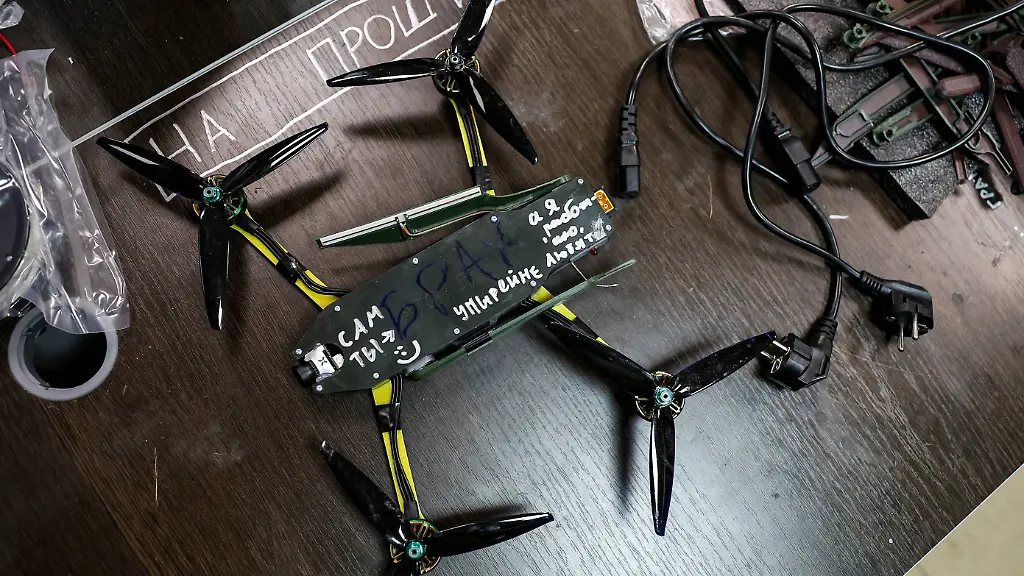 RUSSIA-SVERDLOVSK-REGION-OCTOBER-17-2023-Assembling-an-Upyr-FPV-drone-The-Upyr-is-intended-for-attacking-the-enemy-in-the-remote-edge-of-the-battle-area-and-destroying-armoured-hardware-on-defilade-positions-The-drone-can-carry-RPG-7-grenades-hand-grenades-and-anti-tank-grenades-RKG-3M-and-high-explosive-fragmentation-charges-made-by-the-military-in-battle-areas