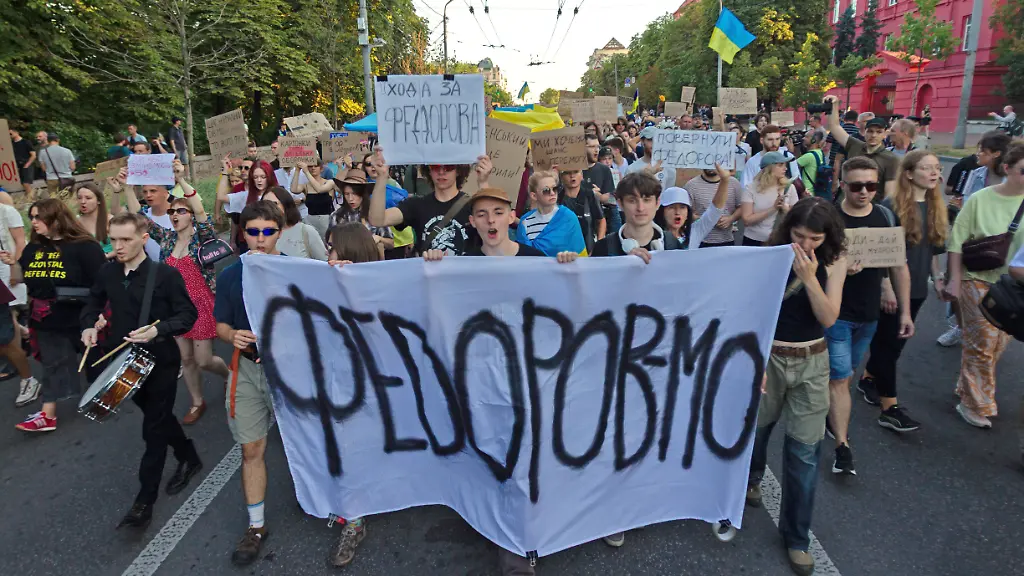 Activists-walk-with-a-banner-reading-Fedorov-Defence-Minister-during-the-United-Protest-March-for-dialogue-and-reforms-in-the-defence-sector-Kyiv-Ukraine-July-31-2026-The-main-demand-of-participants-was-the-reinstatement-of-Mykhailo-Fedorov-as-Ukraines-Minister-of-Defence-Thousands-of-people-carrying-cardboard-placards-marched-along-Tarasa-Shevchenka-Boulevard-Khreshchatyk-and-Arkhitectora-Horodetskoho-Street-to-Ivana-Franka-Square-the-site-of-previous-protests
