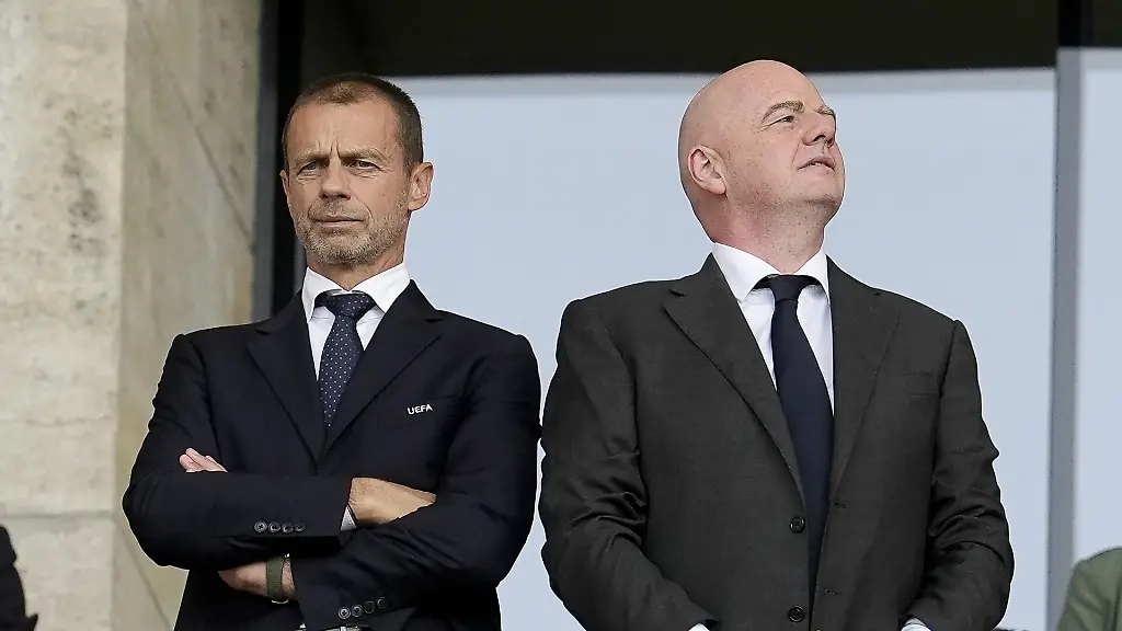 Aleksander-Ceferin-File-Photo-File-photo-dated-29-06-2024-of-UEFA-president-Aleksander-Ceferin-left-with-FIFA-president-Gianni-Infantino-Ceferin-says-taking-matches-away-from-their-community-roots-risks-breaking-football-Issue-date-Wednesday-October-8-2025-Photo-credit-should-read-Nick-Potts-PA-Wire