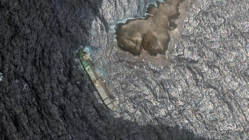This-satellite-image-from-Planet-Labs-PBC-shows-crude-oil-leaking-and-spreading-from-the-sanctioned-Suezmax-tanker-Caroline-Bezengi-grounded-off-the-coast-of-Oman-on-Friday-July-31-2026