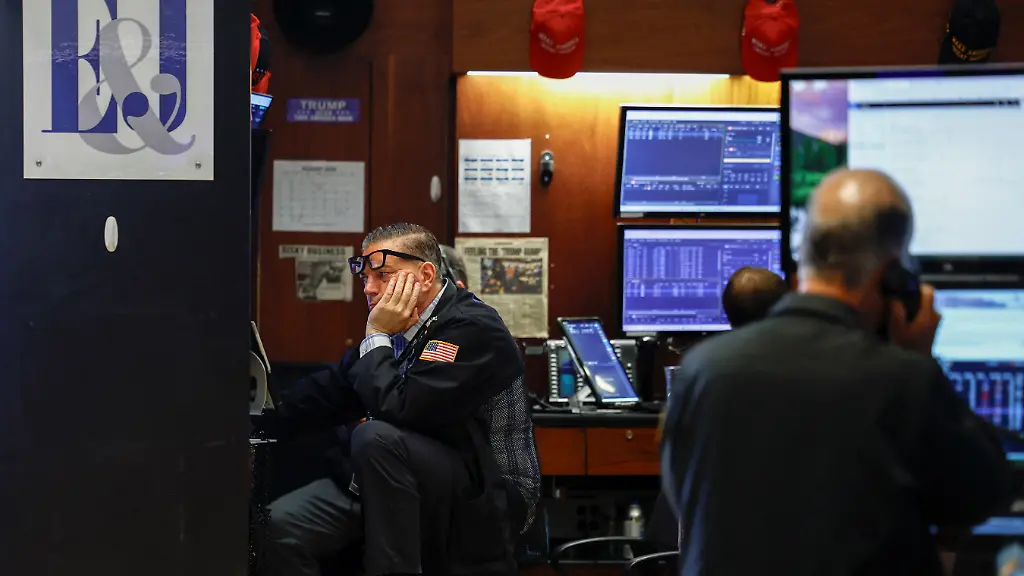 A-trader-works-on-the-floor-of-the-New-York-Stock-Exchange-NYSE-in-New-York-City-U-S-August-5-2026