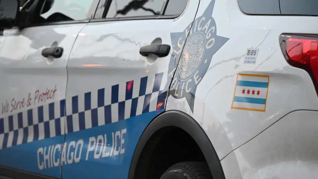 Chicago-police-are-patrolling-the-area-following-a-mass-shooting-that-is-injuring-six-people-on-S-Winchester-Avenue-in-Chicago-Illinois-United-States-on-June-17-2024-At-approximately-1-57-a-m-Monday-morning-on-the-6000-block-of-S-Winchester-Avenue-Chicago-police-are-finding-multiple-victims-who-are-struck-by-gunfire-A-33-year-old-female-is-sustaining-one-gunshot-wound-to-the-back-and-is-listed-in-good-condition-A-34-year-old-female-is-being-struck-in-the-hip-and-is-in-good-condition-A-24-year-old-female-victim-is-sustaining-one-gunshot-wound-to-the-leg-and-is-in-good-condition-A-20-year-old-male-is-sustaining-one-gunshot-wound-to-the-neck-and-is-in-critical-condition-A-31-year-old-male-is-being-struck-in-the-ankle-and-is-in-good-condition-A-32-year-old-male-victim-is-sustaining-a-gunshot-wound-to-the-foot-and-is-listed-in-good-condition-Preliminary-information-is-indicating-that-two-individuals-in-close-proximity-to-the-victims-are-producing-firearms-and-are-beginning-to-exchange-gunfire-before-fleeing-the-scene-There-are-no-suspects-in-custody