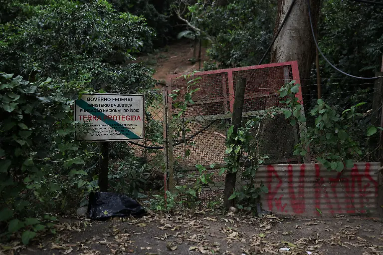 A-sign-from-the-federal-government-with-information-about-the-Indigenous-territory-and-stating-it-is-protected-land-in-the-Jaragua-Indigenous-Territory-in-Sao-Paulo-Brazil-November-15-2025-The-Jaragua-Indigenous-Territory-in-the-Atlantic-Forest-is-increasingly-being-swallowed-up-by-the-Sao-Paulo-suburbs-REUTERS-Amanda-Perobelli-SEARCH-PEROBELLI-BRAZIL-BEES-FOR-THIS-STORY-SEARCH-WIDER-IMAGE-FOR-ALL-STORIES