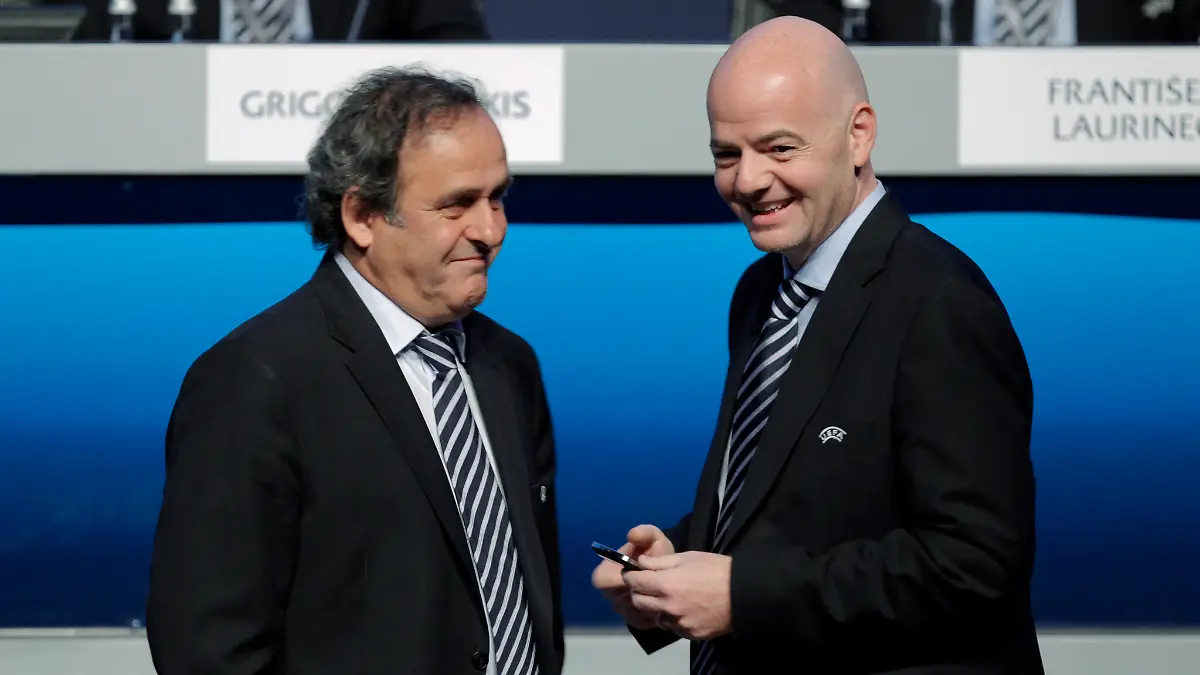 epa03154481-UEFA-President-Michel-Platini-L-and-UEFA-General-Secretary-Gianni-Infantino-R-chat-before-the-XXXVI-Ordinary-UEFA-Congress-2012-in-Istanbul-Turkey-22-March-2012-The-UEFA-Executive-Committee-Meeting-and-the-XXXVI-Ordinary-UEFA-Congress-2012-is-being-held-in-Istanbul