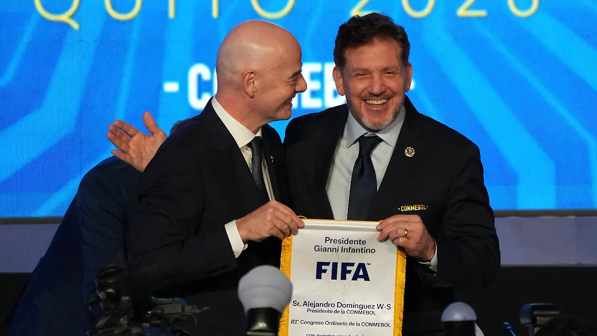FIFA-President-Gianni-Infantino-left-and-CONMEBOL-President-Alejandro-Dominguez-attend-the-CONMEBOL-Congress-in-Quito-Ecuador-Thursday-April-23-2026