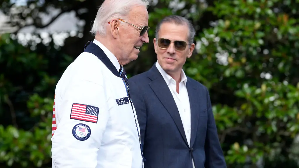 FILE-President-Joe-Biden-wearing-a-Team-USA-jacket-and-walking-with-his-son-Hunter-Biden-heads-toward-Marine-One-on-the-South-Lawn-of-the-White-House-in-Washington-July-26-2024