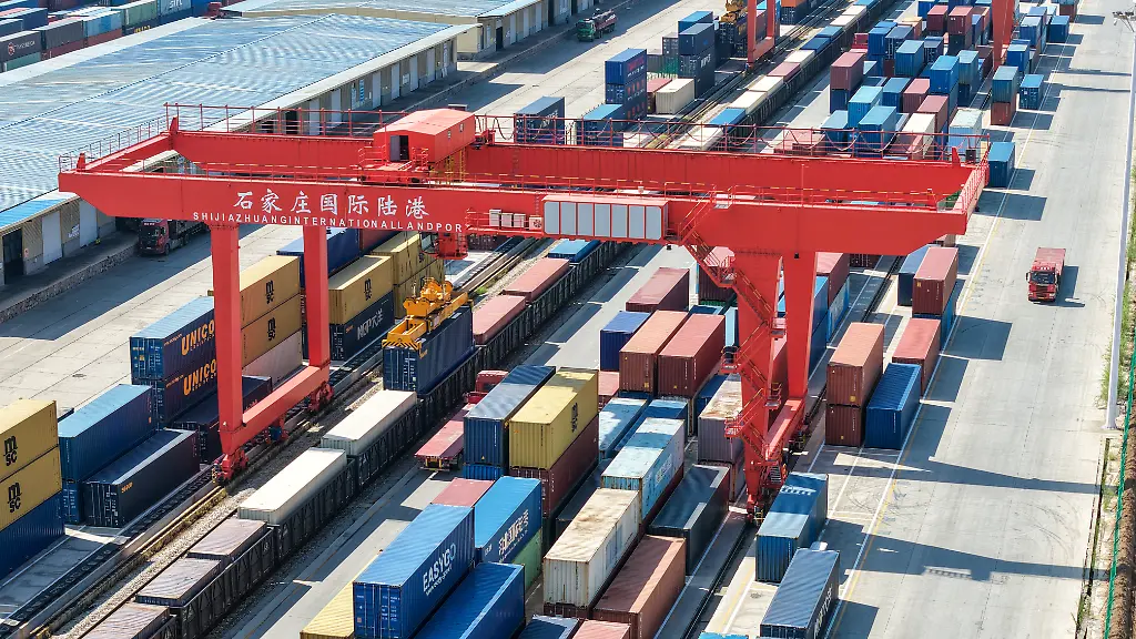260804-SHIJIAZHUANG-Aug-4-2026-Xinhua-This-aerial-drone-photo-taken-on-Aug-4-2026-shows-a-container-loading-site-of-the-Shijiazhuang-international-land-port-in-north-China-s-Hebei-Province-Shijiazhuang-international-land-port-in-north-China-s-Hebei-Province-handled-a-total-of-814-China-Europe-and-China-Central-Asia-freight-train-trips-in-the-first-half-of-2026-up-42-06-percent-year-on-year