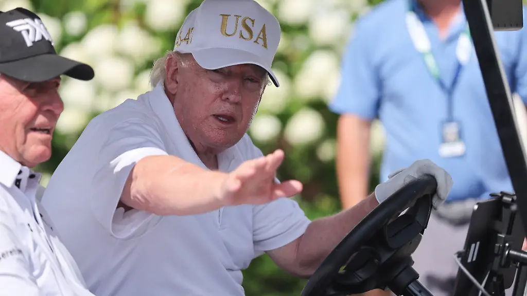 BEDMINSTER-NJ-AUGUST-09-President-Donald-Trump-drives-in-a-golf-cart-at-Bedminster-before-the-forth-round-of-LIV-Golf-New-York-on-August-9-2026-at-Trump-National-Golf-Club-in-Bedminster-New-Jersey