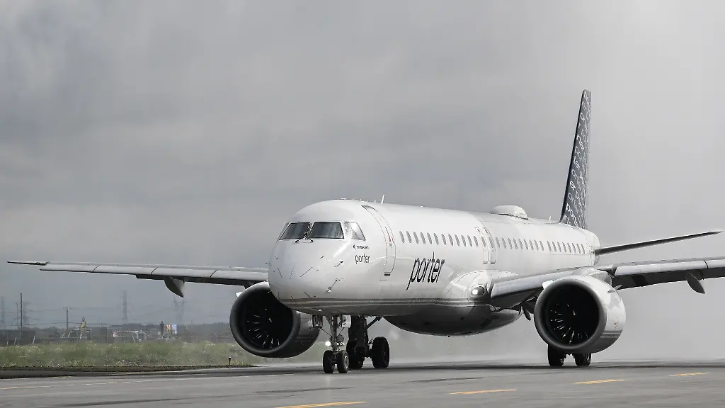 June-15-2026-Longueuil-Pq-Canada-A-Porter-Airlines-jet-is-given-a-water-salute-as-it-prepares-to-take-off-during-the-opening-day-of-commercial-operations-at-YHU-Terminal-at-MET-aAA-Montreal-Metropolitan-Airport-in-Longueuil-Que-on-Monday-June-15-2026