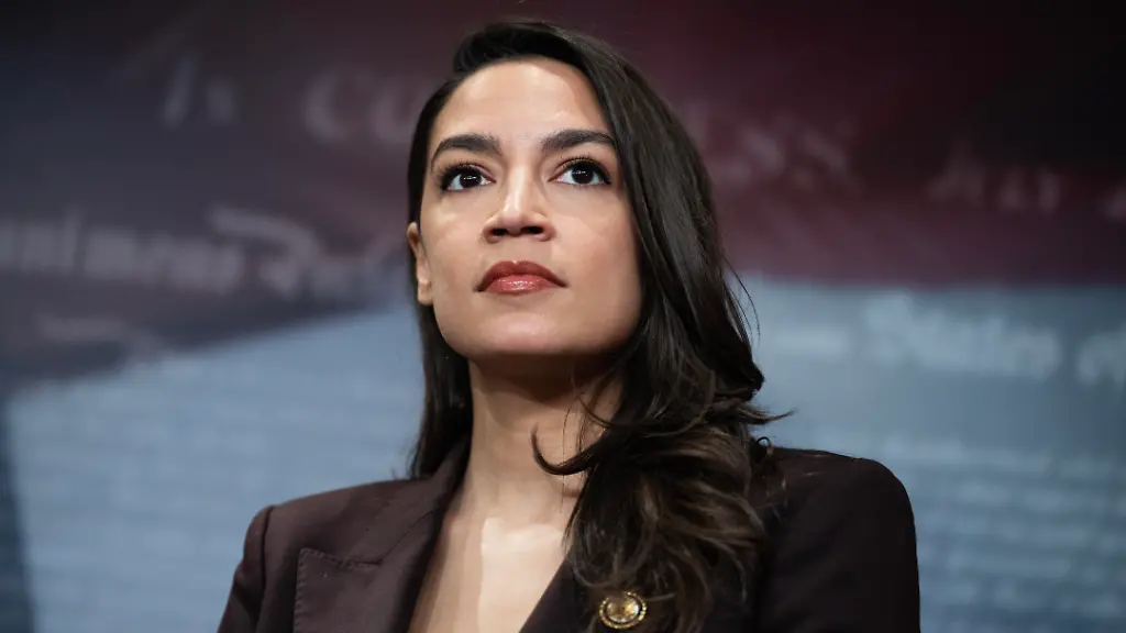 UNITED-STATES-MARCH-25-Rep-Alexandria-Ocasio-Cortez-D-N-Y-attends-a-news-conference-with-Sen-Bernie-Sanders-I-Vt-to-announce-the-Artificial-Intelligence-Data-Center-Moratorium-Act-in-the-U-S-Capitol-on-Wednesday-March-25-2026-The-legislation-aims-to-ensure-that-AI-benefits-workers-is-safe-and-effective-and-does-not-harm-communities-or-destroy-the-environment
