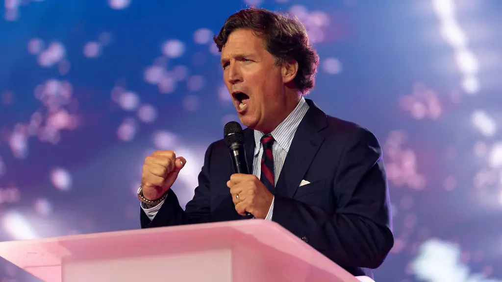 Tucker-Carlson-speaks-during-AmericaFest-the-first-Turning-Point-USA-summit-since-the-death-of-Charlie-Kirk-in-Phoenix-Arizona-U-S-December-18-2025