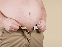 Unrecognizable Overweight Corpulent Man With Fat Belly Unable To Fit Into His Pants Obesity And Adiposity Concept In Wide Web Banner Format With Copy Space Modellfreigabe Vorhanden