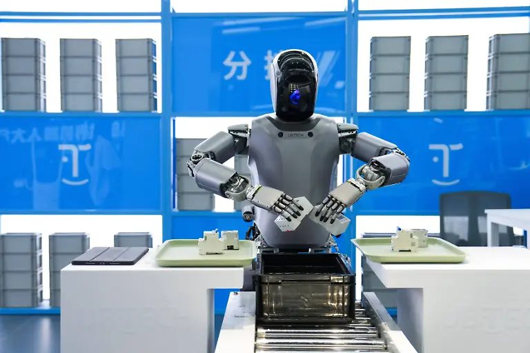 250225-BEIJING-Feb-25-2025-A-humanoid-robot-from-Walker-series-of-UBTECH-conducts-sorting-work-at-the-Beijng-World-of-Robots-in-Beijing-capital-of-China-Feb-24-2025-The-Beijng-World-of-Robots-is-located-in-the-robotics-industrial-park-in-Beijing-s-Yizhuang-and-serves-as-a-comprehensive-robot-exhibition-center-showcasing-the-latest-achievements-in-robotics-industry