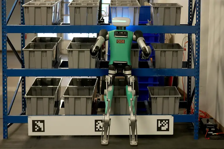 Agility-Robotics-robot-Digit-performs-maneuvers-at-the-company-s-office-in-Pittsburgh-Wednesday-Aug-16-2023-Agility-co-founder-Jonathan-Hurst-makes-a-point-of-describing-Agility-s-warehouse-robot-Digit-as-human-centric-not-humanoid-a-distinction-meant-to-emphasize-what-it-does-over-what-it-s-trying-to-be