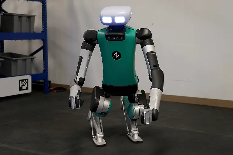 Agility-Robotics-robot-Digit-performs-gestures-at-the-company-s-office-in-Pittsburgh-Wednesday-Aug-16-2023-Digit-has-a-head-containing-cameras-other-sensors-and-animated-eyes-and-a-torso-that-essentially-works-as-its-engine