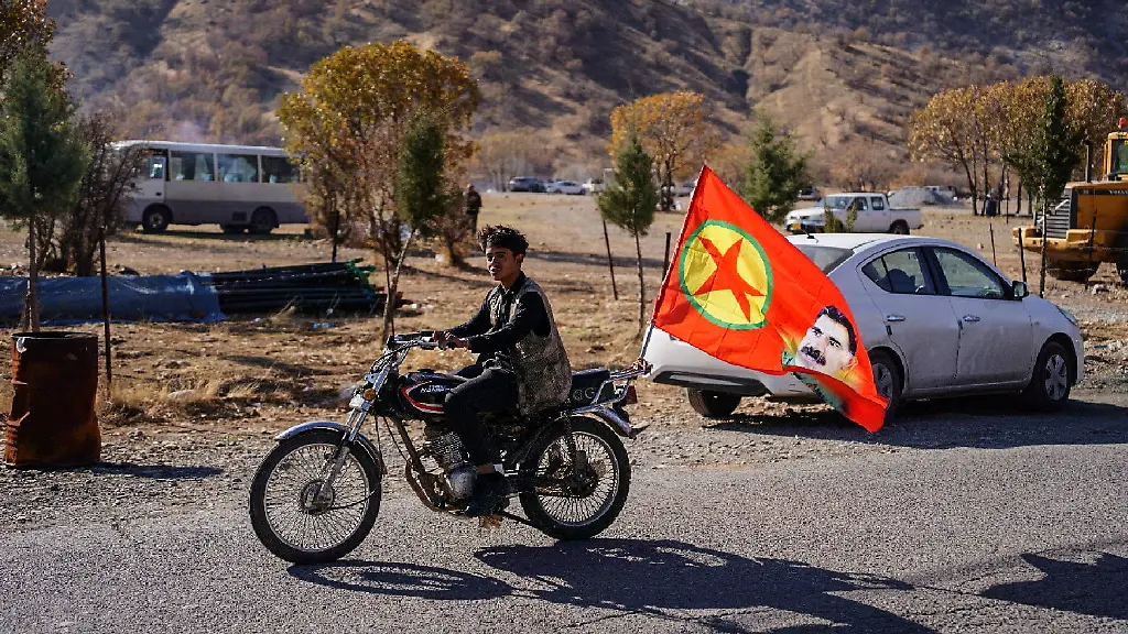 November-28-2025-Qandil-Mountains-Kurdistan-Iraq-Guerrilla-vehicle-adorned-with-flags-turn-out-for-the-anniversary-celebrations-A-look-inside-the-PKK-s-base-as-guerrilla-fighters-and-supporters-gather-to-celebrate-the-47th-anniversary-of-the-PKK-Kurdistan-Workers-Party-amid-the-ongoing-peace-process-with-Turkey