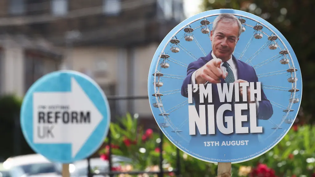 A-Nigel-Farage-placard-stands-ahead-of-a-by-election-triggered-by-Reform-UK-party-leader-Nigel-Farage-s-resignation-as-MP-for-the-Clacton-on-Sea-constituency-in-Clacton-on-Sea-Britain-August-6-2026