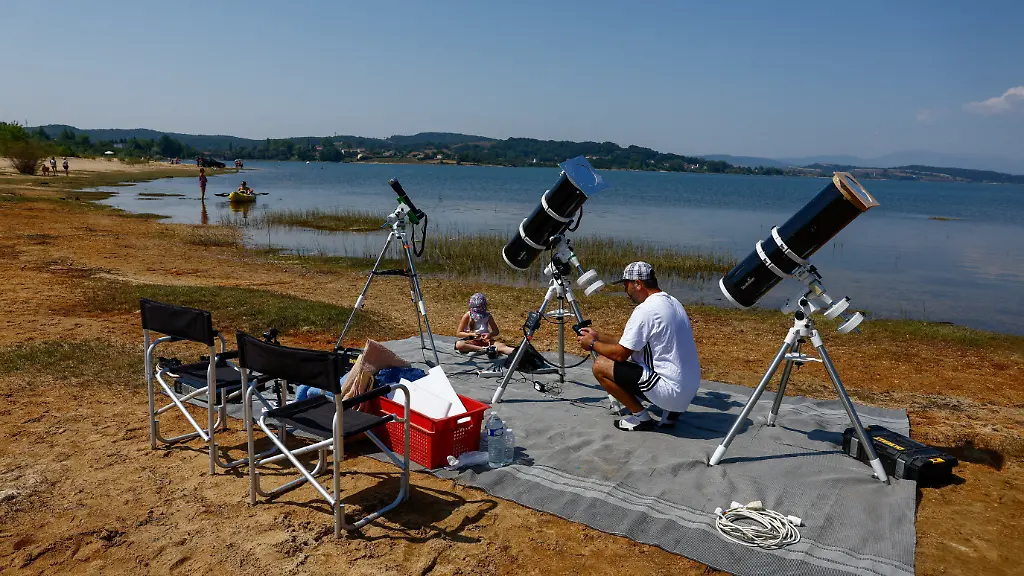 Frenchman-Leyssalle-Anthony-39-prepares-a-telescope-to-view-the-total-solar-eclipse-from-the-beach-in-Arija-Spain-August-12-2026