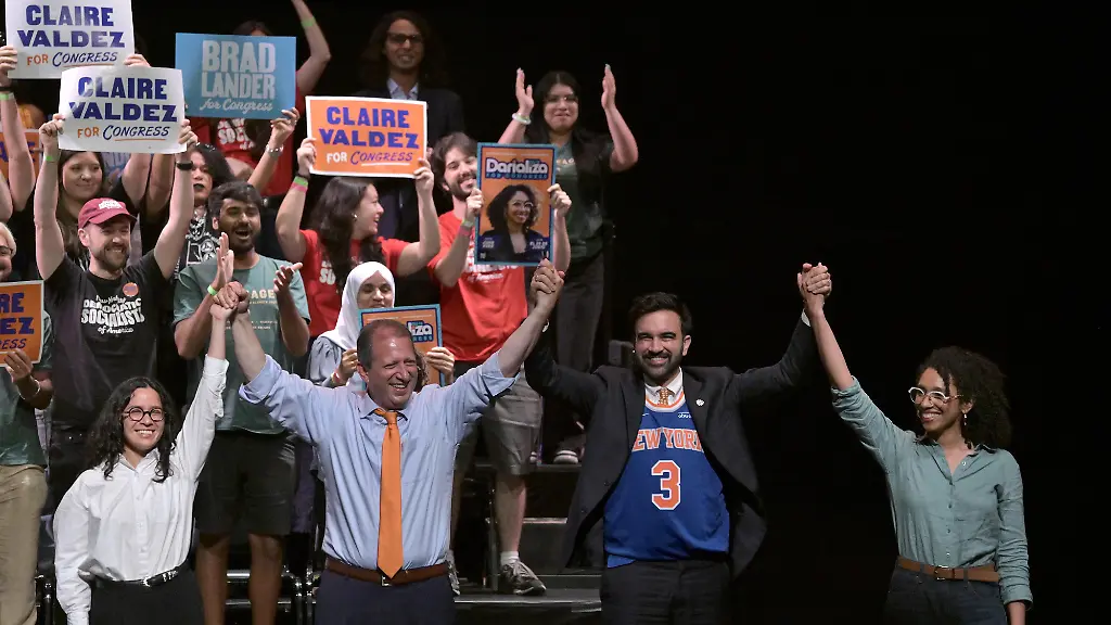 L-R-Congressional-candidate-Claire-Valdez-Congressional-candidate-Brad-Lander-Mayor-Zohran-Mamdani-and-Congressional-candidate-Darializa-Avila-Chevalier-raise-their-hands-during-the-Our-Team-Our-Year-Get-Out-The-Vote-GOTV-rally-for-local-candidates-ahead-of-next-week-s-Primary-Elections-at-the-Kings-Theatre-in-the-Brooklyn-borough-of-New-York-City-NY-June-18-2026