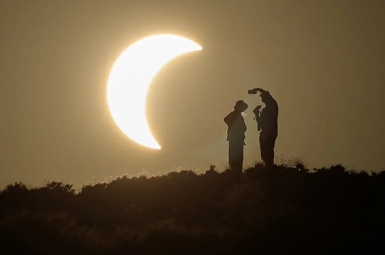 Scientists-and-astronomy-enthusiasts-observe-a-total-solar-eclipse-before-totality-at-the-Galactica-Centre-near-the-Javalambre-Astrophysical-Observatory-in-Arcos-de-las-Salinas-near-Teruel-Spain-August-12-2026