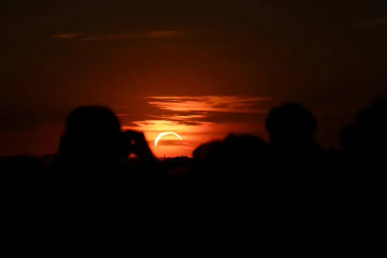 People-watch-the-partial-solar-eclipse-on-Sophienalpe-in-Vienna-Austria-August-12-2026