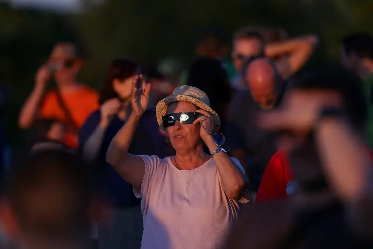 People-watch-the-partial-solar-eclipse-on-Sophienalpe-in-Vienna-Austria-August-12-2026