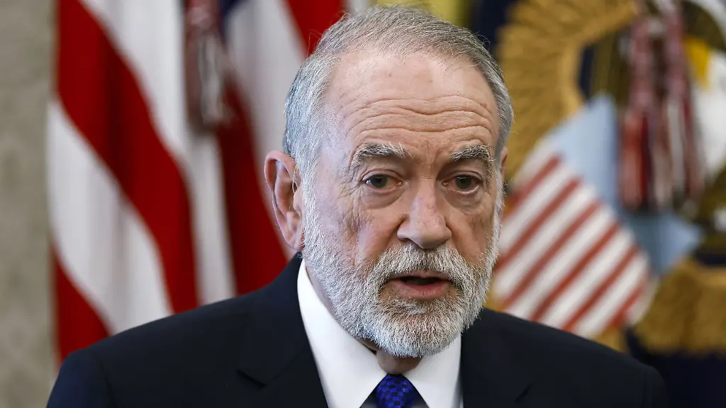 United-States-Ambassador-to-Israel-Mike-Huckabee-listens-as-US-President-Donald-Trump-speaks-to-the-media-in-the-Oval-Office-of-the-White-House-in-Washington-DC-USA-23-April-2026-President-Trump-met-with-Lebanese-and-Israeli-envoys-at-the-White-House-for-a-new-round-of-peace-talks