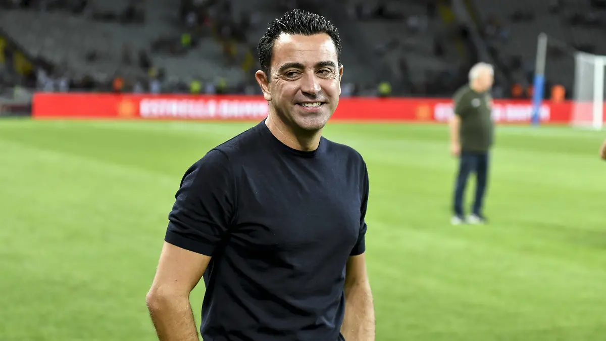 FC-Barcelona-Barca-v-Tottenham-58th-Joan-Gamper-Trophy-BARCELONA-SPAIN-AUGUST-08-Xavi-Hernandez-R-head-coach-of-Barcelona-follows-the-58th-Joan-Gamper-Trophy-match-between-Barcelona-and-Tottenham-Hotspur-FC-at-the-Lluis-Companys-Olympic-Stadium-on-August-08-2023-Spain-World-Editorial-use-only-Please-get-in-touch-for-any-other-usage