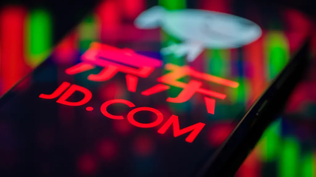The-JD-com-logo-is-displayed-on-a-smartphone-screen-in-this-photo-illustration-The-Chinese-online-retail-giant-reports-mixed-financial-results-and-faces-intensifying-competition-from-rivals-as-a-price-war-in-China-s-e-commerce-sector-pressures-margins-and-consumer-demand-remains-uneven-This-photo-is-taken-in-Brussels-Belgium-on-March-5-2026