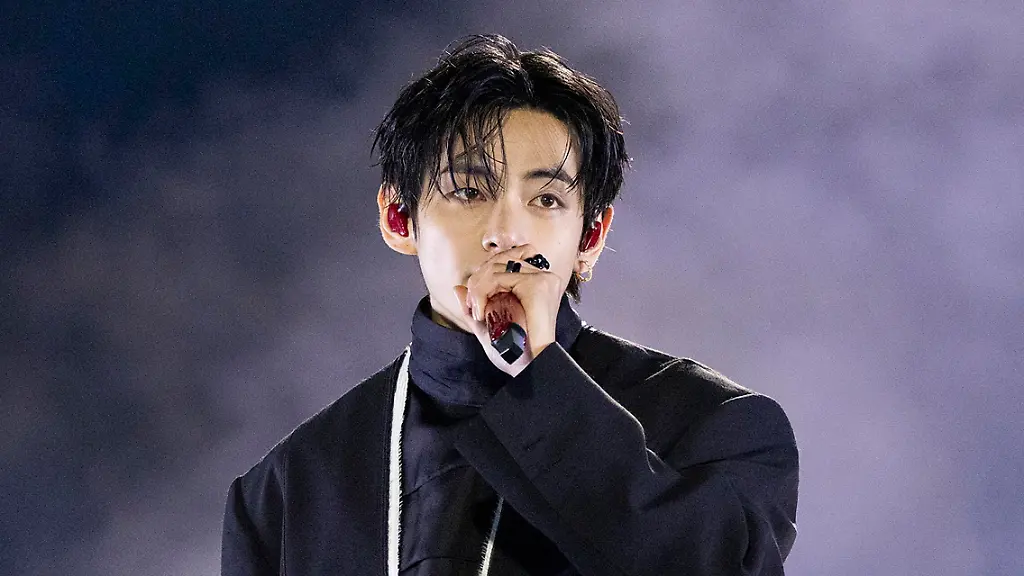 21-March-2026-Seoul-South-Korea-In-This-Photo-Handout-Provided-by-BIGHIT-Netflix-BTS-member-V-performs-on-the-stage-during-a-come-back-live-concert-Arirang-at-Gwanghwa-mun-main-street-in-Seoul-South-Korea-on-March-21-2026