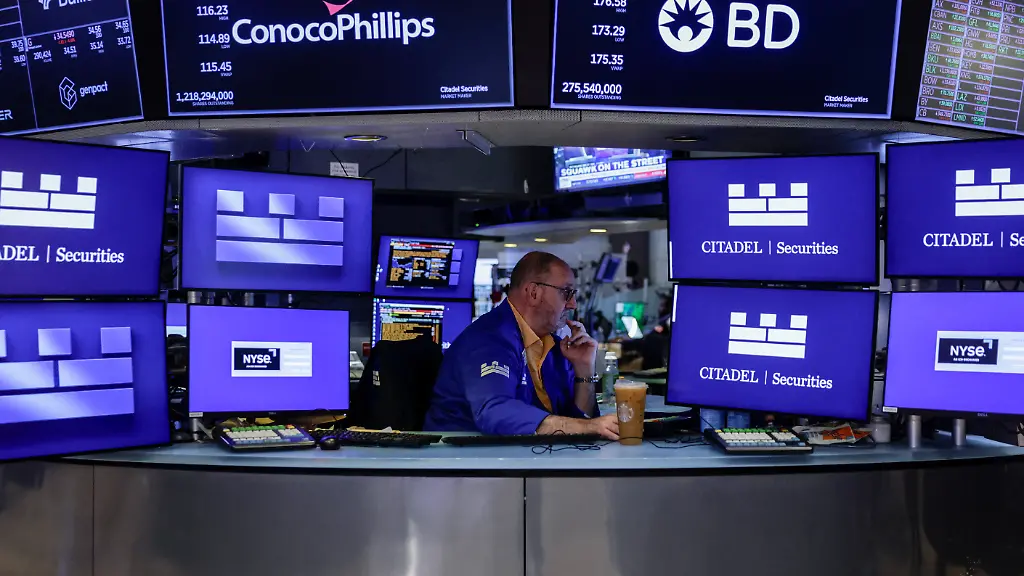 A-trader-works-on-the-floor-of-the-New-York-Stock-Exchange-NYSE-in-New-York-City-U-S-August-7-2026