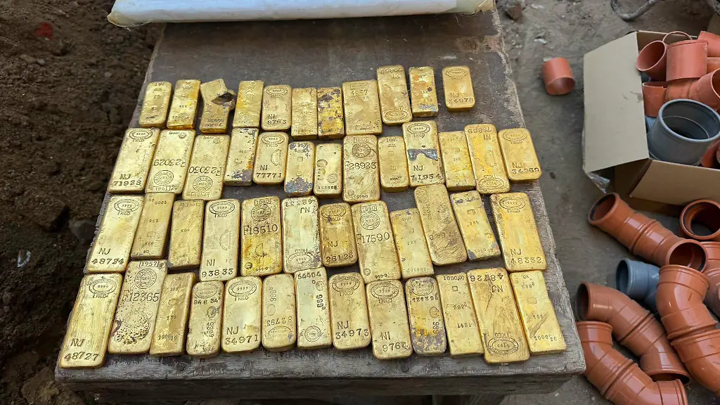 WORDS-BYLINE-Hayley-Chamberlain-Builders-renovating-a-property-were-stunned-after-discovering-gold-worth-an-estimated-7-6-MILLION-hidden-inside-its-walls-The-haul-of-gold-bars-and-coins-was-uncovered-as-workers-drilled-into-the-foundations-of-the-building-in-Dendermonde-Belgium-while-installing-new-sewage-pipes-Among-the-crew-was-18-year-old-student-Kobe-who-was-working-a-summer-job-He-initially-thought-the-coins-were-ordinary-1-pieces-before-spotting-what-appeared-to-be-a-gold-nugget-Kobe-told-Belgian-broadcaster-VRT-Our-first-reaction-was-actually-disbelief-amazement-At-first-I-thought-they-were-1-coins-But-then-we-also-saw-a-gold-nugget-lying-there-That-s-when-we-realised-it-was-something-bigger-The-haul-reportedly-worth-around-9m-7-6m-was-handed-to-police-Site-manager-Mario-said-There-are-so-many-coins-and-bars-it-would-be-almost-impossible-Besides-that-would-be-theft-Kobe-added-9m-you-simply-can-t-keep-that-hidden-The-property-in-East-Flanders-is-owned-by-welfare-organisation-CAW-Oost-Vlaanderen-Director-Geert-Hillaert-said-his-reaction-was-surprise-and-amazement-and-hopes-the-treasure-could-eventually-help-fund-the-charity-s-work-and-meet-the-enormous-need-we-experience-daily-But-exactly-who-will-end-up-with-the-fortune-could-take-years-to-establish-The-local-prosecutor-has-launched-an-investigation-to-discover-where-the-gold-came-from-and-identify-its-rightful-owner-Under-Belgian-law-an-owner-has-five-years-to-come-forward-and-claim-the-treasure-If-nobody-does-hidden-treasure-found-on-someone-else-s-property-can-be-divided-between-the-finder-and-the-property-owner-potentially-leaving-the-builders-and-charity-in-line-for-a-huge-windfall-However-that-would-not-apply-if-the-gold-is-found-to-be-linked-to-criminal-activity