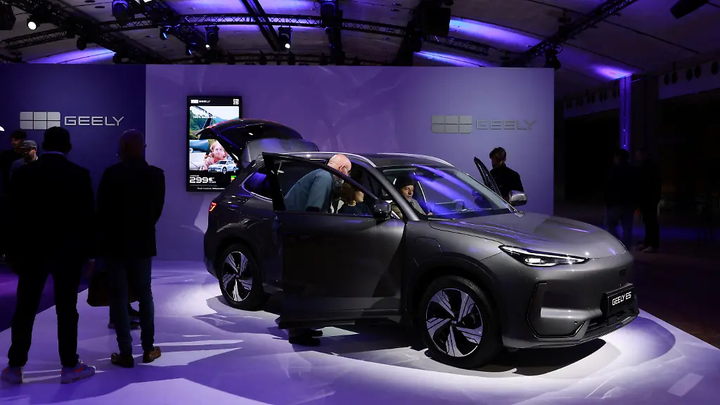 Journalists-look-at-the-Geely-E5-electric-compact-SUV-car-presented-during-a-press-conference-for-the-launching-of-Geely-Auto-France-in-Paris-France-April-28-2026