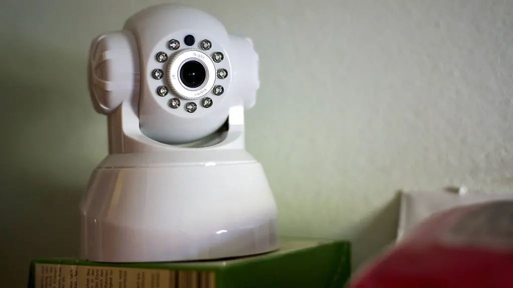 Augsburg-Bavaria-Germany-April-13-2024-Secret-and-hidden-surveillance-camera-as-burglar-protection-in-a-house-Heimliche-und-versteckte-Ueberwachungskamera-als-Einbrecher-Schutz-in-einem-Haus