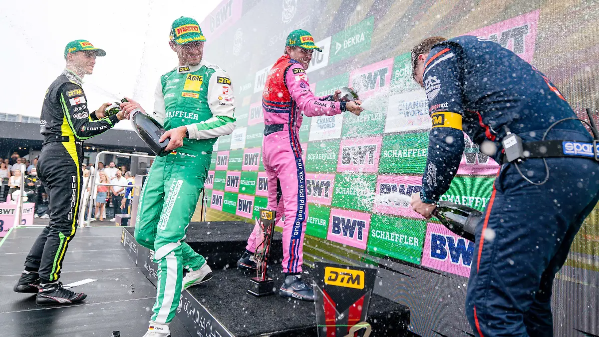 Das-DTM-Podium-auf-dem-Nuerburgring-Thomas-Preining-Marco-Wittmann-und-Matteo-Cairoli-l-r
